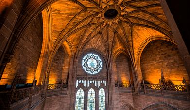Inside the cathedral showing the impressive vaulted ceilings and stained glass windows