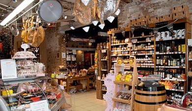 Inside the Lunya store filled with wines, meats and other deli goods.
