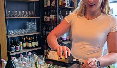 Paige making Cocktails