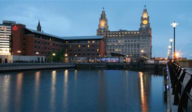 A view of the Liver Building with Crowne Plaza Hotel beside it.