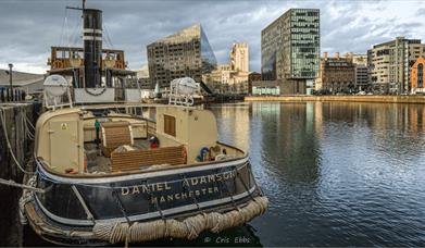 A boat docked by Royal Albert Dock Liverpool.