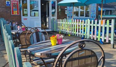 Front of Flissy's, outdoor dining area